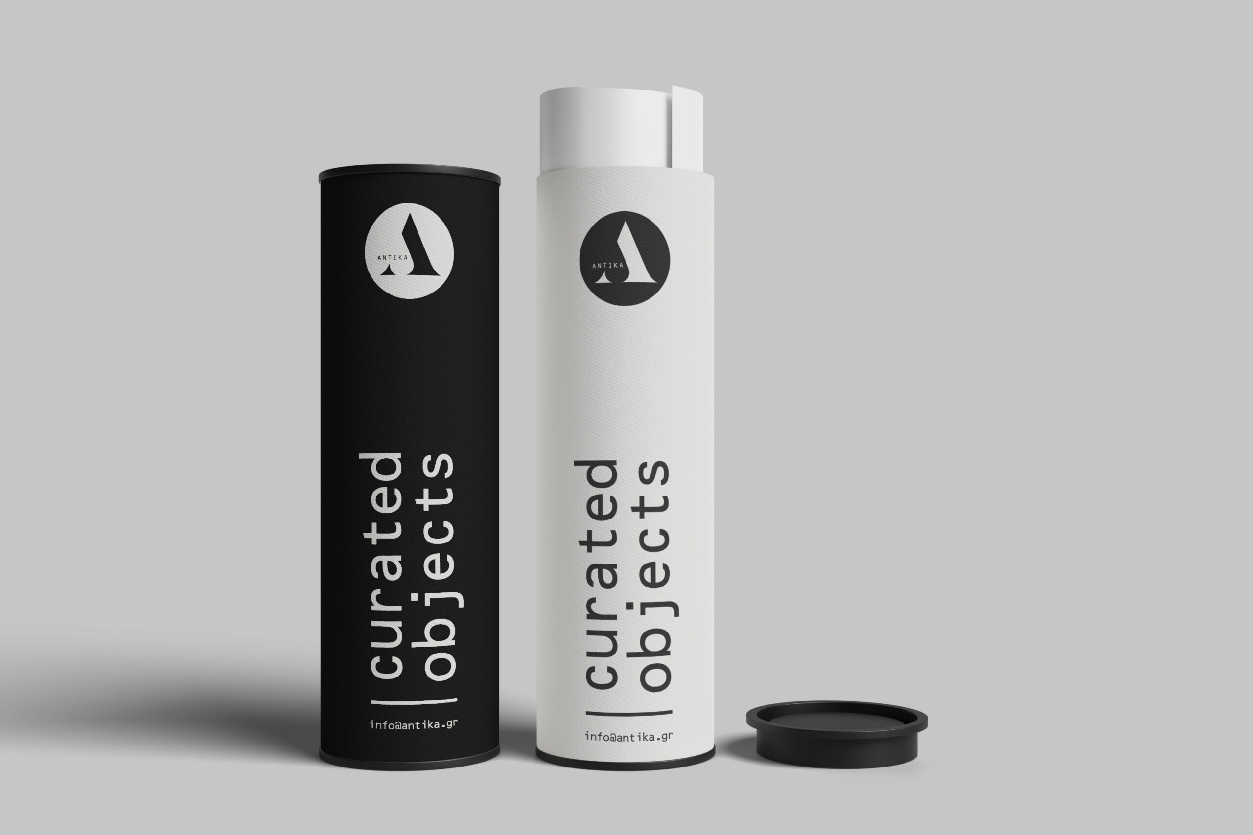 A cylindrical black and white paper tube with a clear white label displaying product details.