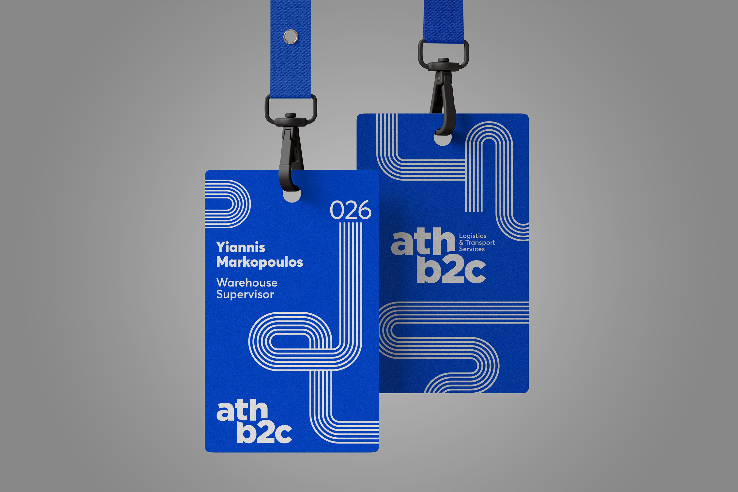 Two blue lanyards with the athb2c logo, intended for holding ID cards at the conference.
