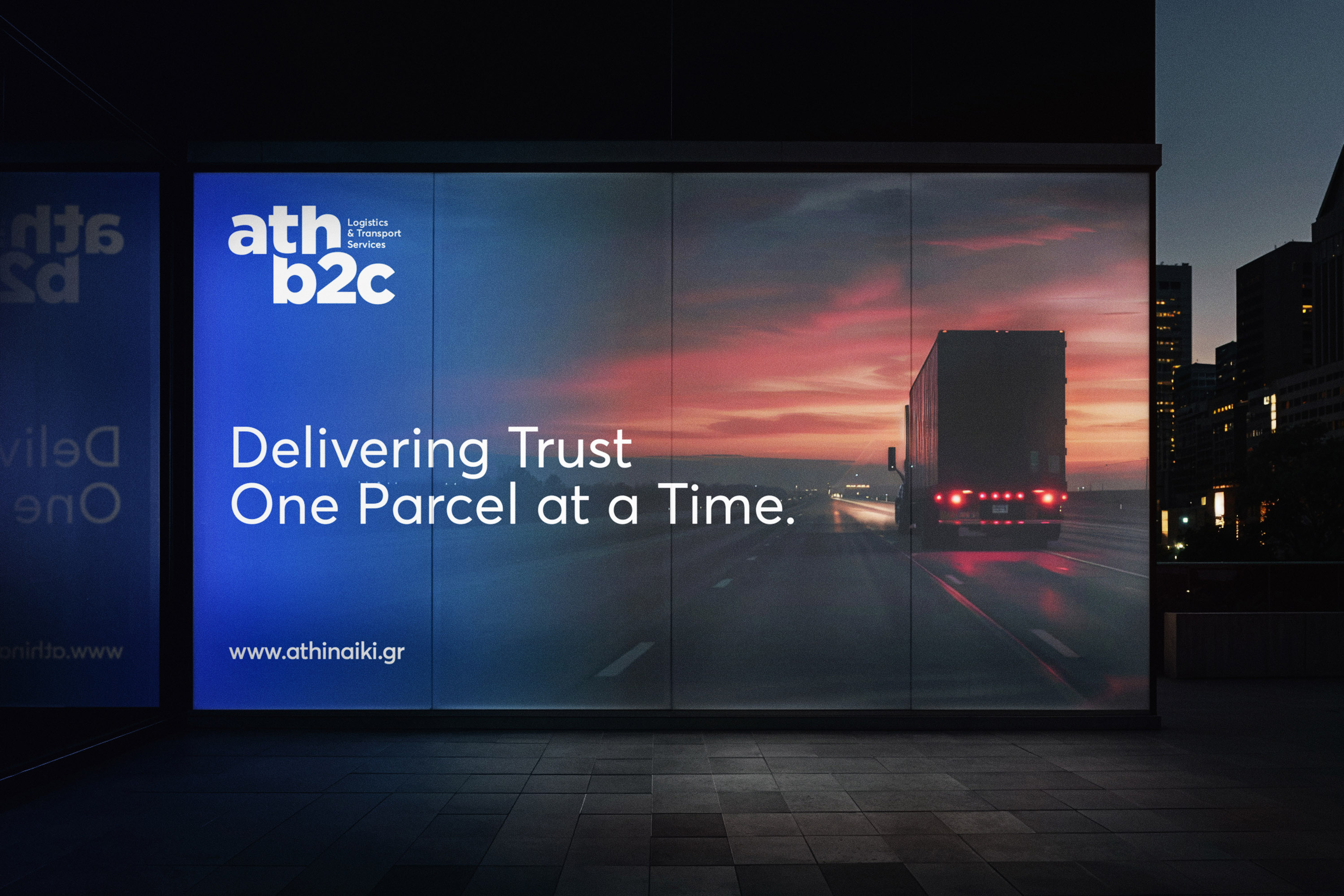 Large billboard advertisement for athb2c, featuring eye-catching graphics and text highlighting the company's services.