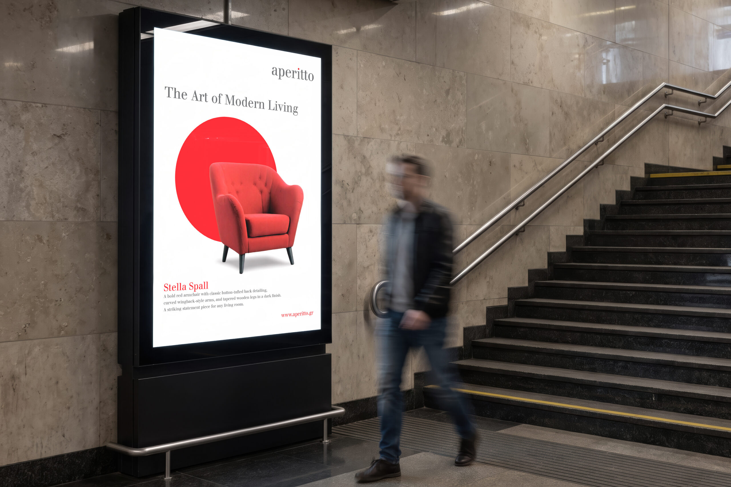 A man walks down stairs next to a prominent Aperitto advertisement in the metro station.