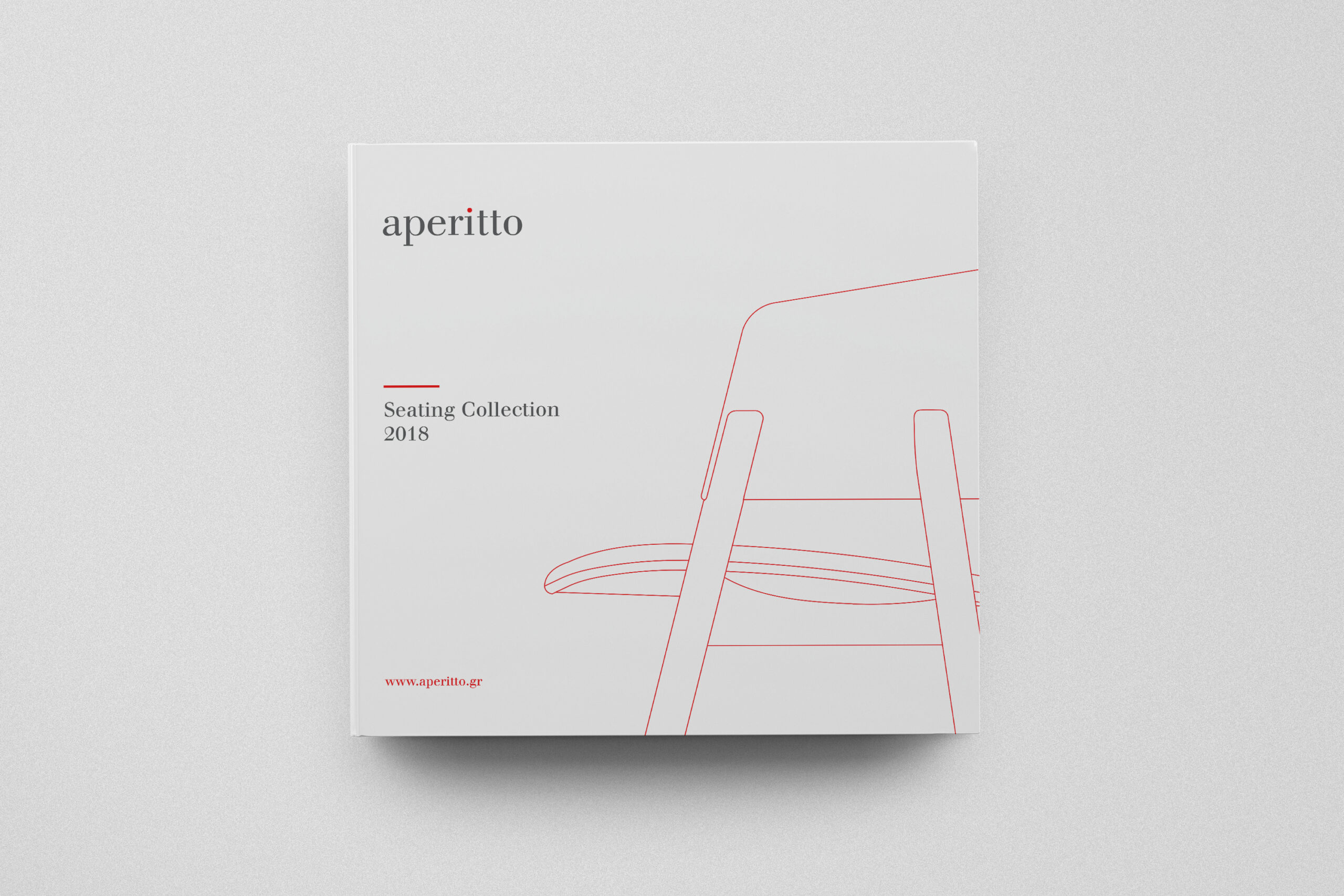 Aperitto seating catalogue cover displaying a minimalist design with a white cover and striking red lines.