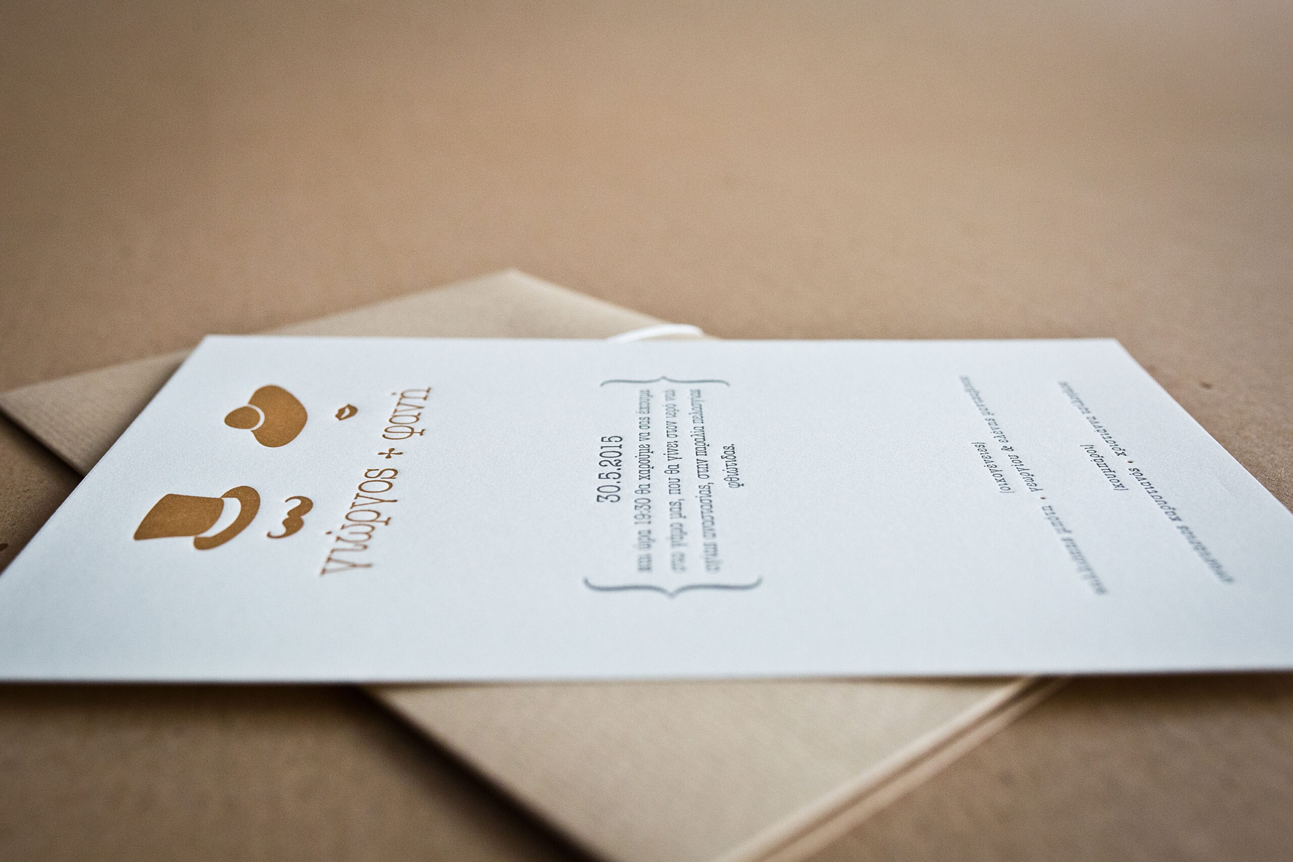 Wedding Letterpress typograhy invitation with custom craft envelope and paper tag hanger.