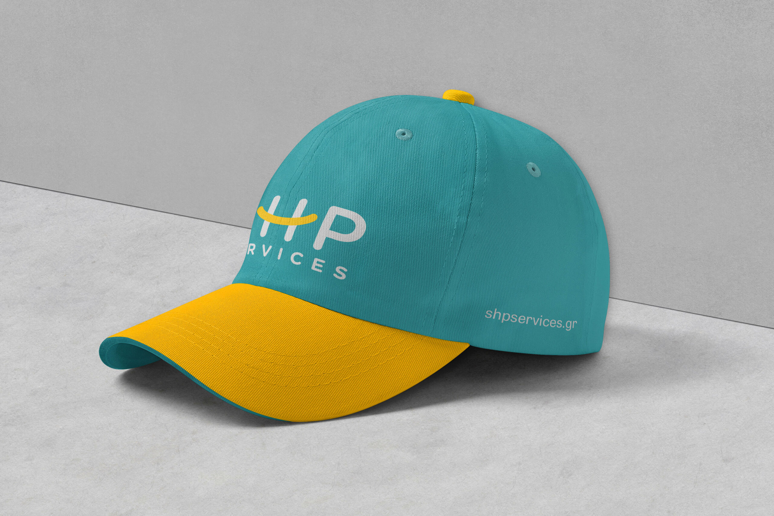 SHP Services baseball cap design.